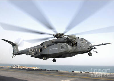Lamborghini Cars - A Ch-53 Sea Stallion Helicopter Leaves by Stocktrek Images