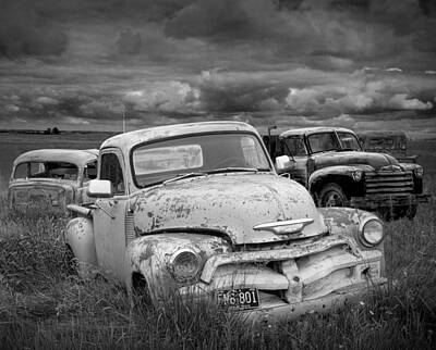Randall Nyhof Photo Royalty Free Images - Black and white Photograph of a Junk Yard with Vintage Auto Bodies Royalty-Free Image by Randall Nyhof