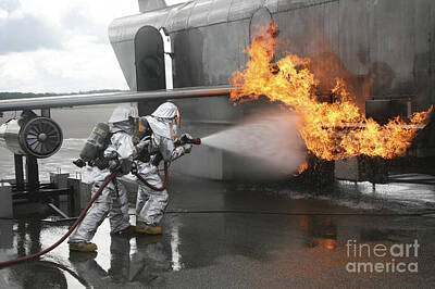 Surrealism - Firefighters Extinguish An Exterior by Stocktrek Images