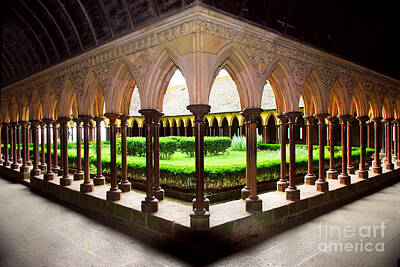 Landmarks Rights Managed Images - Mont Saint Michel cloister garden Royalty-Free Image by Elena Elisseeva