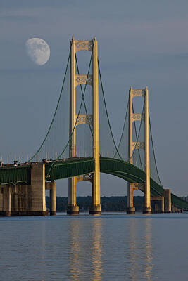 Randall Nyhof Photo Royalty Free Images - Moon and the Mackinaw Bridge by the Straits of Mackinac Royalty-Free Image by Randall Nyhof