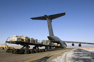 The Delicate Female - Pallets Await Loading Onto A C-5 Galaxy by Stocktrek Images