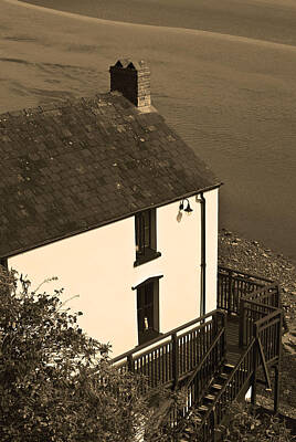 The Stinking Rose - The Boathouse at Laugharne Sepia by Steve Purnell