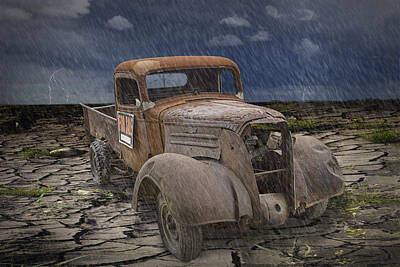 Randall Nyhof Royalty-Free and Rights-Managed Images - Vintage Junk Auto in the Rain by Randall Nyhof