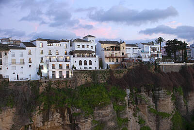 City Lights - White houses at sunset hanging over clif ronda by Perry Van Munster