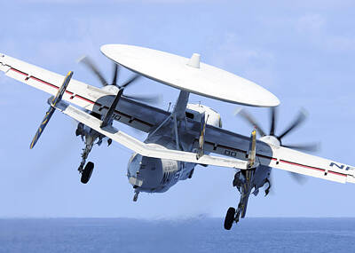 Politicians Photos - An E-2c Hawkeye Launches by Stocktrek Images