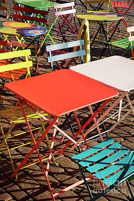 Misty Fog Royalty Free Images - Colourful Modern Trendy Tables And Chairs At Street Cafe Royalty-Free Image by JM Travel Photography