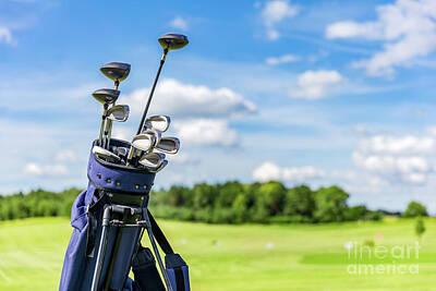 Sports Photos - Golf equipment bag standing on a course. by Michal Bednarek
