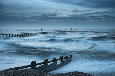 Sugar Skulls - Beautiful dramatic stormy landscape image of waves crashing onto by Matthew Gibson