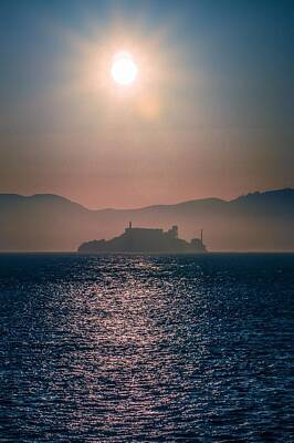 Landmarks Rights Managed Images - Alcatraz island prison San Francisco bay at sunset Royalty-Free Image by Alex Grichenko