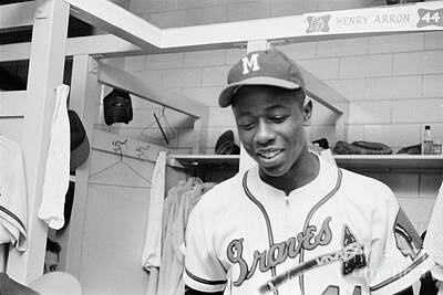 Baseball Rights Managed Images - Hank Aaron in the locker room, 1958 Royalty-Free Image by The Harrington Collection