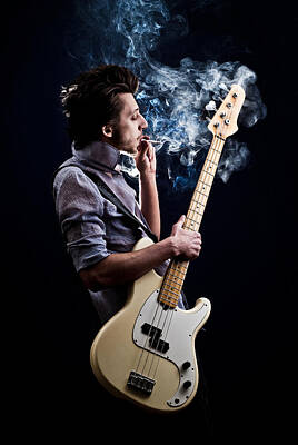 Musicians Photo Rights Managed Images - Man With A Guitar  Royalty-Free Image by Elena Saulich