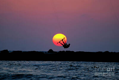 Cargo Boats - Kite surfing at sunset by Tomi Junger