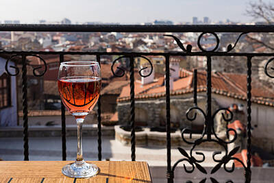 Wine Royalty-Free and Rights-Managed Images - A Dreamy Glass of Rose - Enjoying a Fabulous View from a Wrought Iron Balcony by Georgia Mizuleva