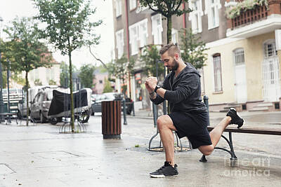 Athletes Photos - A man working out on a street by Michal Bednarek