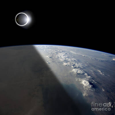 Science Fiction Photos - A Solar Eclipses Partially Shades by Marc Ward