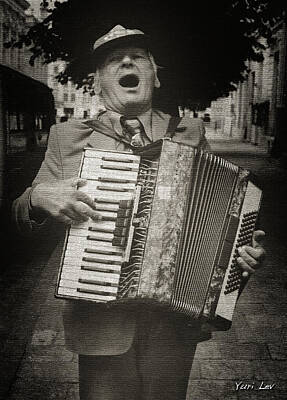 Musician Royalty-Free and Rights-Managed Images - A Street Musician in Lviv, Ukraine by Yuri Lev