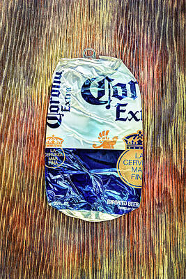 Beer Rights Managed Images - Beer Can Extra Blue Crushed on Plywood 81 Royalty-Free Image by YoPedro