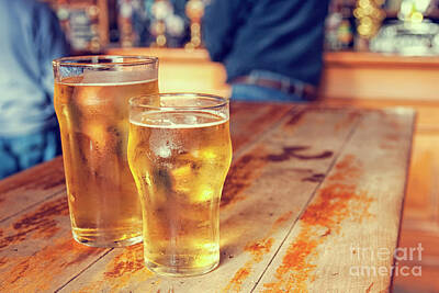 Beer Rights Managed Images - Beers in a pub Royalty-Free Image by Patricia Hofmeester