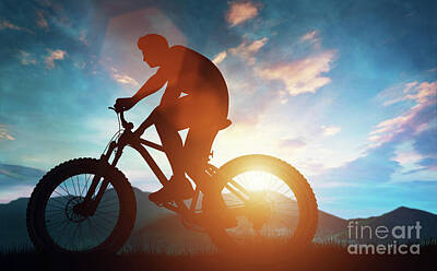 Athletes Rights Managed Images - Biker riding his bicycle in the mountains. Royalty-Free Image by Michal Bednarek