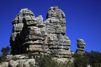Frank Sinatra Rights Managed Images - Bizarre rock formations in National Park El Torca, Paraje Natural Torcal de Antequera, El Torcal de Antequera is a nature reserve in the Sierra del Torcal mountain range, Andalusia,  Provinz Malaga, Spain Royalty-Free Image by Heinz Tschanz-Hofmann