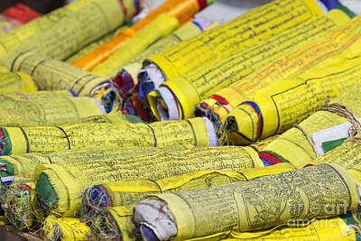 Art History Meets Fashion Rights Managed Images - Buddhist Tibetan prayer flags rolled into a roll, Kathmandu, Nep Royalty-Free Image by Mariusz Prusaczyk