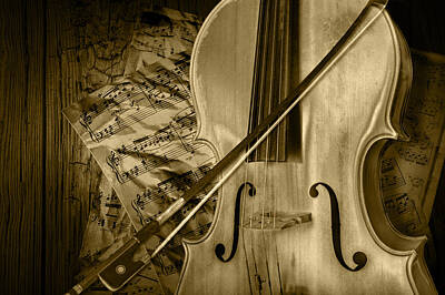 Randall Nyhof Royalty Free Images - Cello Stringed Instrument with Sheet Music and Bow in Sepia Royalty-Free Image by Randall Nyhof