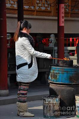 Wild Horse Paintings - Chinese woman burns incense offering at Taoist temple by Imran Ahmed