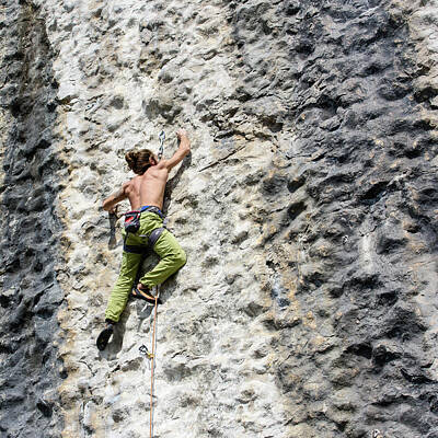 Wine Down Rights Managed Images - Climbing. Technical gesture. Royalty-Free Image by Nicola Simeoni