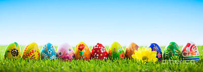 Florals Rights Managed Images - Colorful hand painted Easter eggs on grass Royalty-Free Image by Michal Bednarek