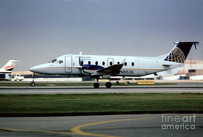 Halloween Elwell Royalty Free Images - Continental Express Beech 1900D N81536 Royalty-Free Image by Wernher Krutein