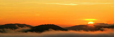 Mammals Rights Managed Images - Dawn over Clouds Royalty-Free Image by Tony Beaver