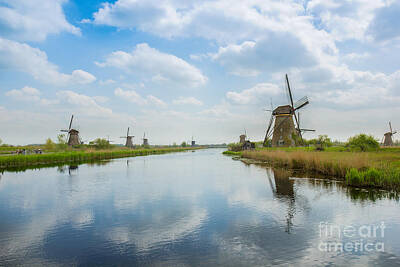 Chris Walter Rock N Roll Royalty Free Images - Dutch Windmills In Summer Day Royalty-Free Image by Anastasy Yarmolovich