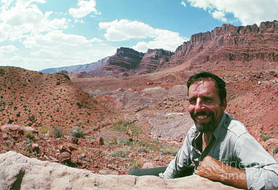 Portraits Photos - Edward Abbey in the desert, 1969 by The Harrington Collection