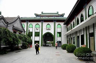 Green Grass - Elderly Chinese Muslim man walks in entrance courtyard of mosque Beijing China by Imran Ahmed