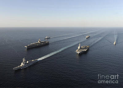 Politicians Photo Royalty Free Images - Fleet Of Navy Ships Transit The Arabian Royalty-Free Image by Stocktrek Images