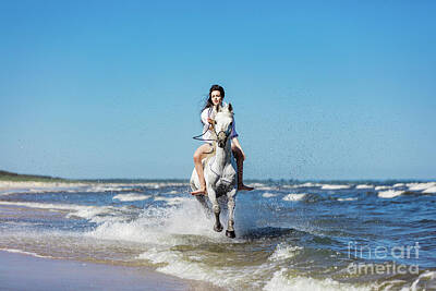 Nothing But Numbers Royalty Free Images - Girl galopading on a white horse in the sea Royalty-Free Image by Michal Bednarek