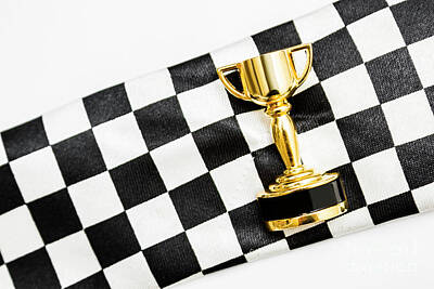 Sports Photos - Gold trophy on a checked sport flag by Jorgo Photography