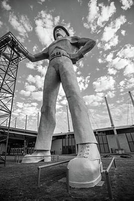 Landmarks Royalty Free Images - Golden Driller Statue - Tulsa Oklahoma - Black and White Royalty-Free Image by Gregory Ballos