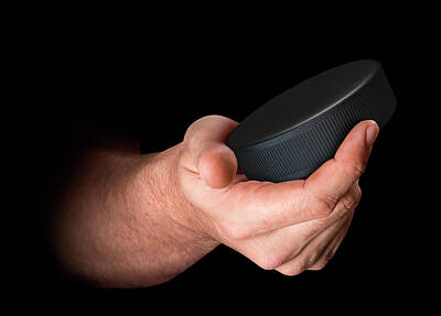 Af One - Hand Holding Hockey Puck by Allan Swart