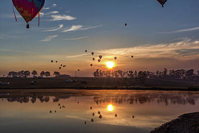 Prescription Medicine - Hot air balloons rising over lake with reflection in water by Justin Mckinney