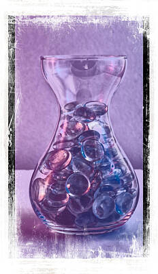 Wallpaper Designs - Jar of glass pebbles in hues of blue and purple. by John Paul Cullen