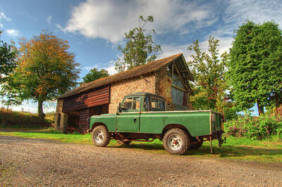 Nautical Animals Rights Managed Images - Landrover and the barn Royalty-Free Image by Rob Hawkins
