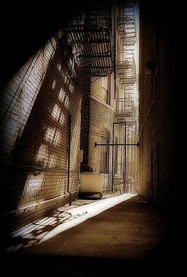 Surrealism Rights Managed Images - Light In The Alley Royalty-Free Image by Jeff Watts