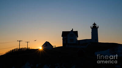 Surrealism Photo Rights Managed Images - Nubble Light Silhouette  Royalty-Free Image by Michael Ver Sprill