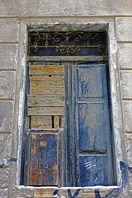 Mellow Yellow Rights Managed Images - Old Weathered Door In Cagliari Sardinia Royalty-Free Image by Rick Rosenshein
