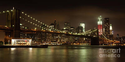 Vintage French Fashion Royalty Free Images - Panoranic view  of Manhattan skyline by night from Brooklyn brid Royalty-Free Image by Samuel Borges
