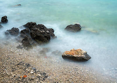 Af Vogue Rights Managed Images - Rocks on a gravel beach in Croatia Royalty-Free Image by Stefan Rotter