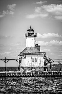 Windmills Rights Managed Images - St. Joseph Michigan Lighthouse in Black and White Royalty-Free Image by Paul Velgos