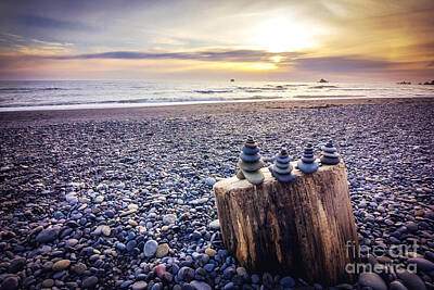 Beach Photos - Stacked Rocks at Sunset by Joan McCool